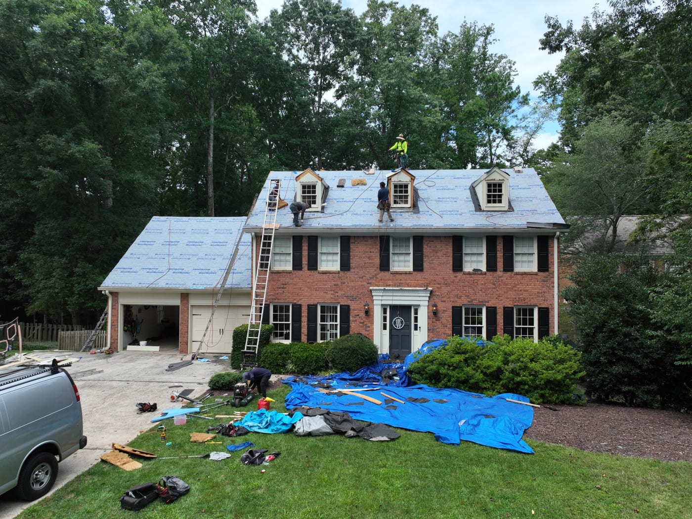 Original unretouched Marietta installation photo showing underlayment before shingle completion