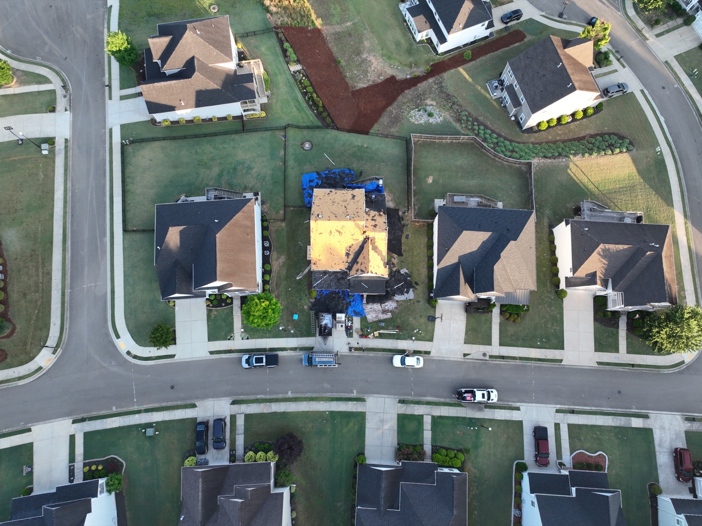 Drone photo showing roof tear-off in progress