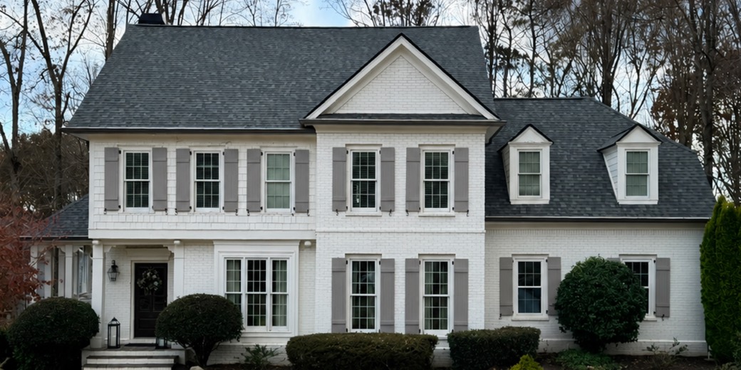 Completed roof replacement on brick home